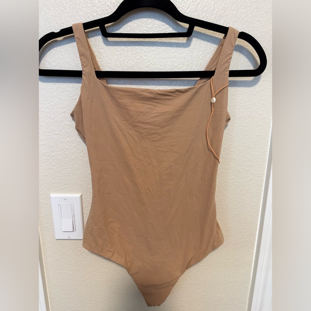 Quince Bodysuit. Never worn with tag.